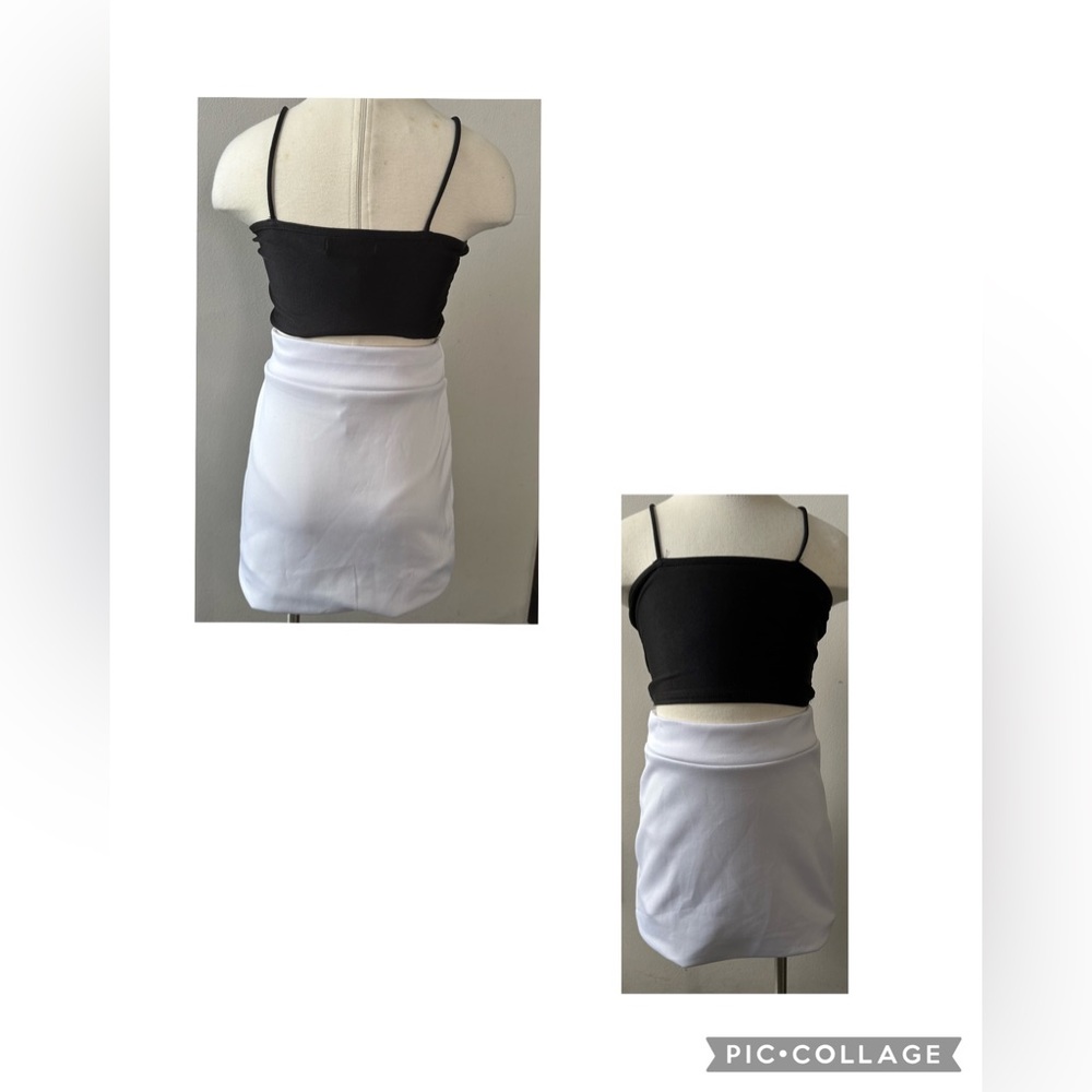2 piece white small skirt and black halter top Worn twice Excellent condition